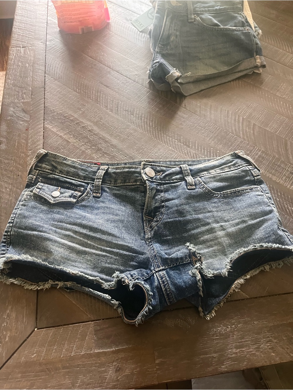 True Religion Distressed Medium Blue Denim Cutoff Shorts
